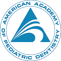 The image shows a logo with text and graphics. It includes the name American Academy of Pediatric Dentistry along with a stylized graphic that resembles a mountain peak or wave-like shape, and there is an emblem with a tooth symbol inside it.
